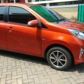 Dijual Mobil Calya G Matic Warna Orange Metalic - Coating Mobil Jakarta Selatan